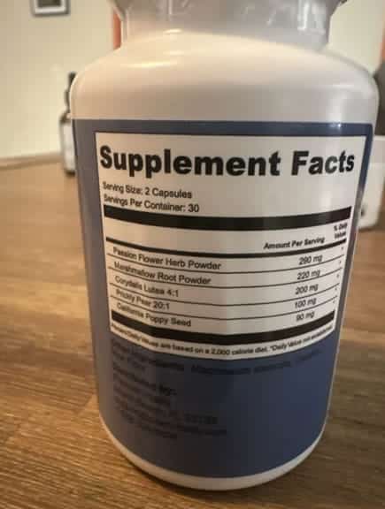 Personal photo holding a Nerve Fresh supplement bottle